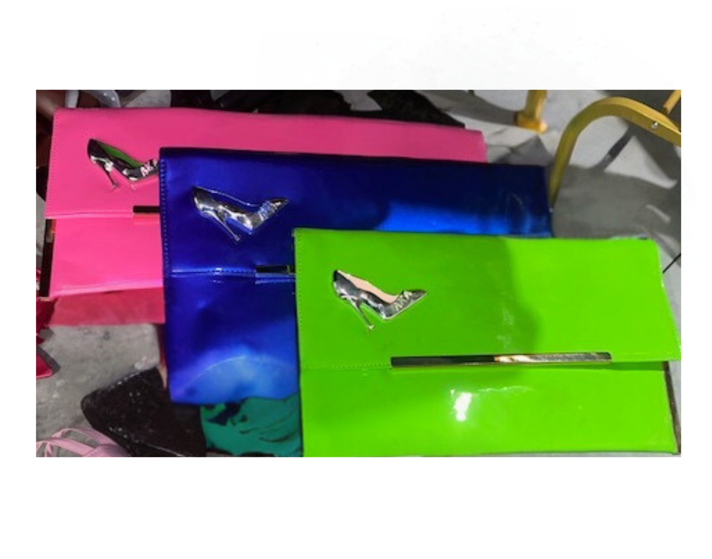(3) A.K.A. Clutch Handbags